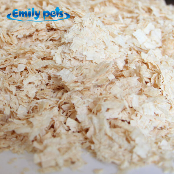Emily-pets-wood-shavings